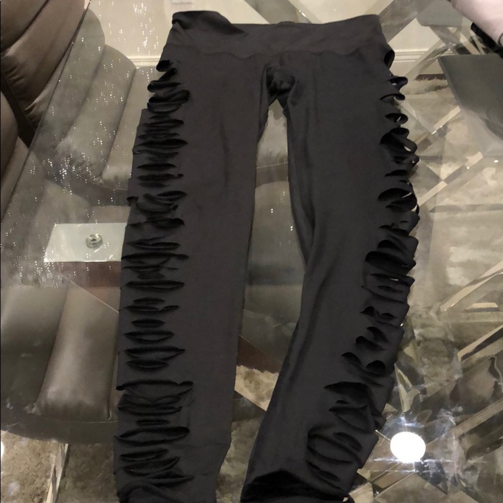 Black leggings with rips on the side panels